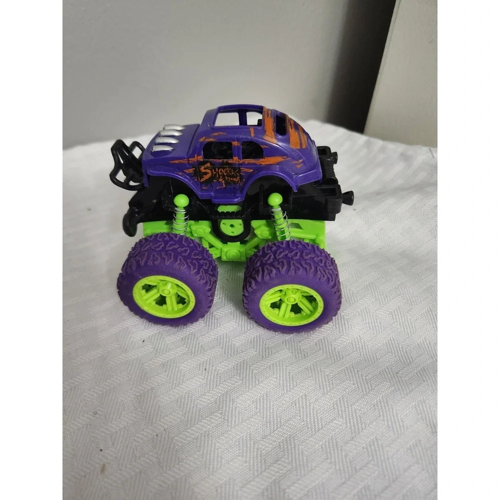 Shocker Monster Truck Toy Purple Green Suspension Off-Road Vehicle Dolgen